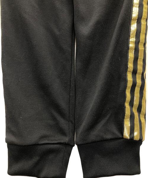 adidas（アディダス）adidas (アディダス) トラックパンツ　オリジナル スーパースター ブラック×ゴールド サイズ:XSの古着・服飾アイテム