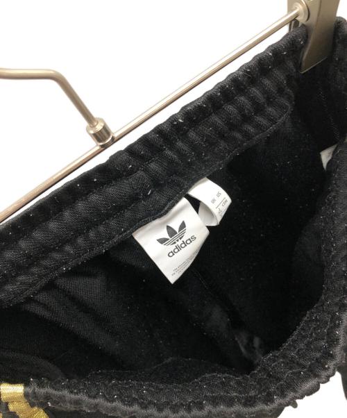 adidas（アディダス）adidas (アディダス) トラックパンツ　オリジナル スーパースター ブラック×ゴールド サイズ:XSの古着・服飾アイテム