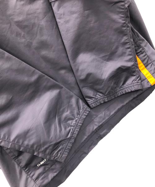 NIKE（ナイキ）NIKE (ナイキ) ナイロンプルオーバー パープル サイズ:Lの古着・服飾アイテム