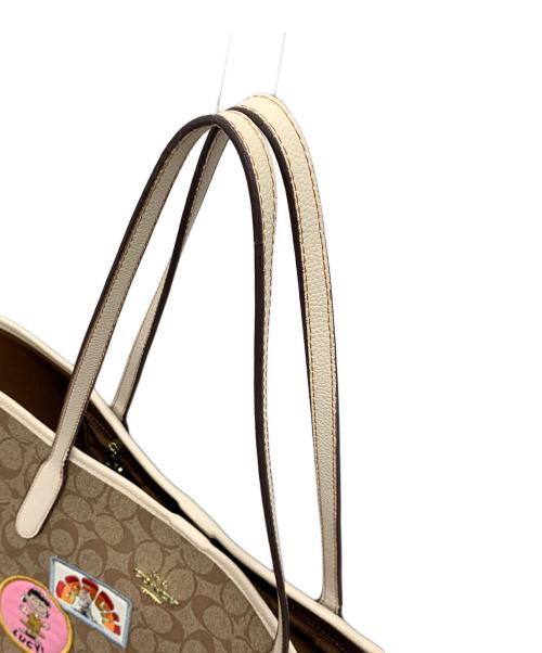 COACH（コーチ）COACH (コーチ) PEANUTS (ピーナッツ) トートバッグ キャンバス ワッペン サイズ:実寸サイズにてご確認ください。の古着・服飾アイテム
