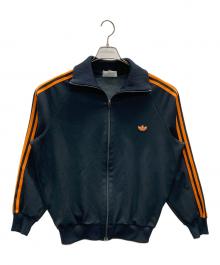 adidas（アディダス）の古着「トラックジャケット」｜ブラック×オレンジ