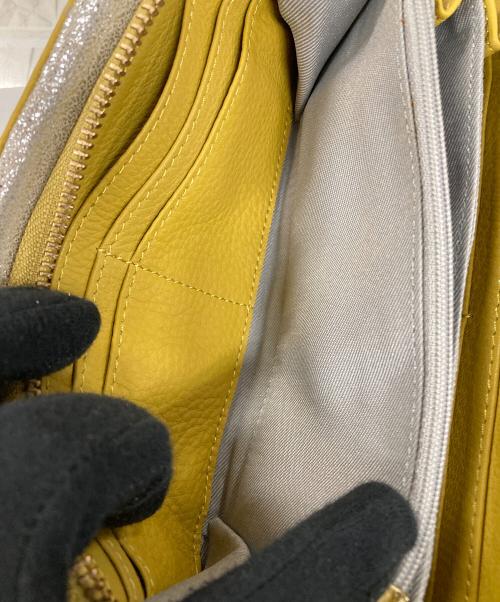 ear PAPILLONNER（イアパピヨネ）ear PAPILLONNER (イアパピヨネ) 長財布 マスタード サイズ:実寸サイズにてご確認ください。の古着・服飾アイテム