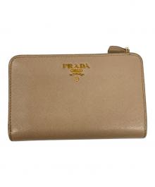 PRADA（プラダ）の古着「2つ折り財布」｜ベージュ