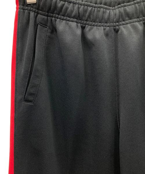 NIKE（ナイキ）NIKE (ナイキ) トラックパンツ ブラック×レッド サイズ:MEN'S Lの古着・服飾アイテム