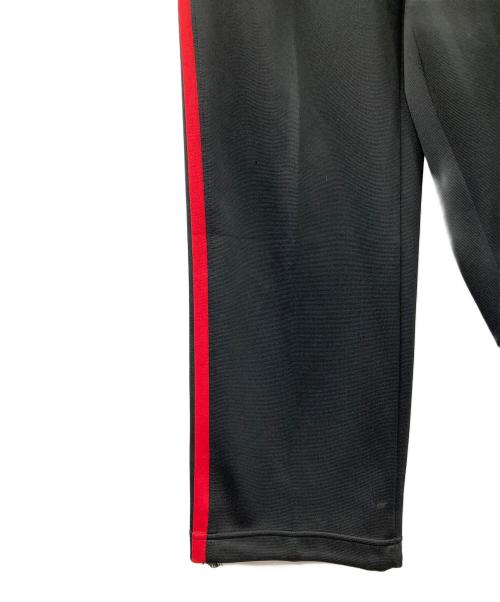 NIKE（ナイキ）NIKE (ナイキ) トラックパンツ ブラック×レッド サイズ:MEN'S Lの古着・服飾アイテム