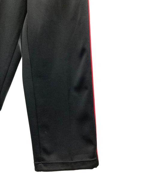 NIKE（ナイキ）NIKE (ナイキ) トラックパンツ ブラック×レッド サイズ:MEN'S Lの古着・服飾アイテム