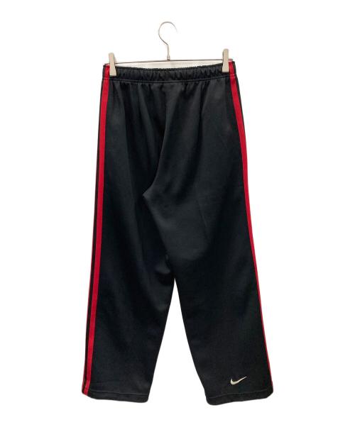 NIKE（ナイキ）NIKE (ナイキ) トラックパンツ ブラック×レッド サイズ:MEN'S Lの古着・服飾アイテム
