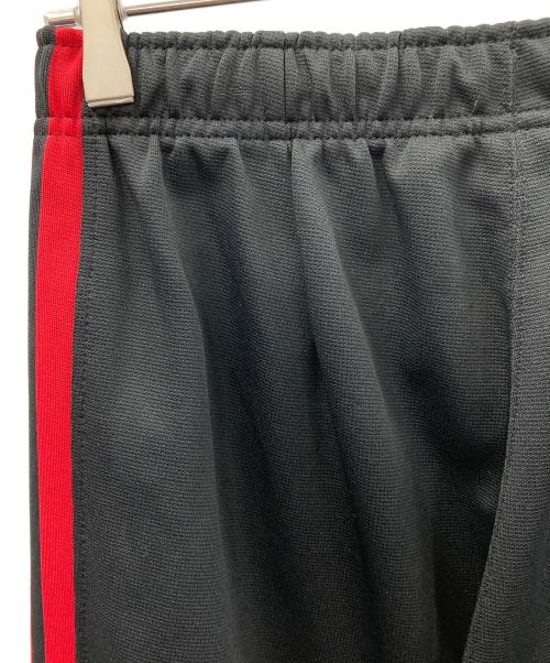 NIKE（ナイキ）NIKE (ナイキ) トラックパンツ ブラック×レッド サイズ:MEN'S Lの古着・服飾アイテム