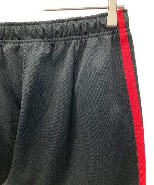 NIKE（ナイキ）NIKE (ナイキ) トラックパンツ ブラック×レッド サイズ:MEN'S Lの古着・服飾アイテム