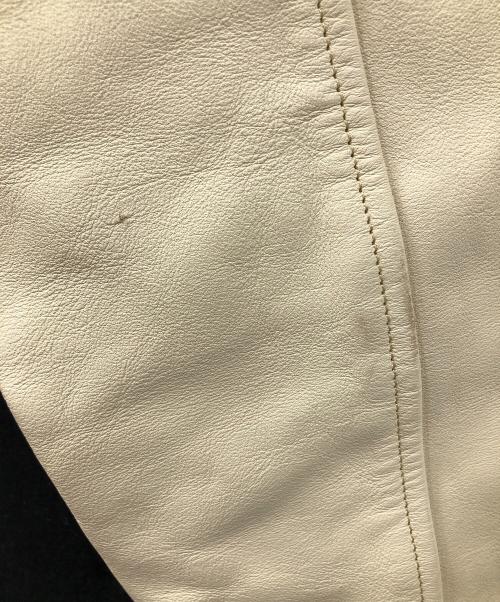 INDIAN MOTORCYCLE（インディアンモーターサイクル）INDIAN MOTORCYCLE (インディアンモーターサイクル) スタジャン ブラック×アイボリー サイズ:40の古着・服飾アイテム