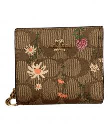 COACH（コーチ）の古着「2つ折り財布 花柄」
