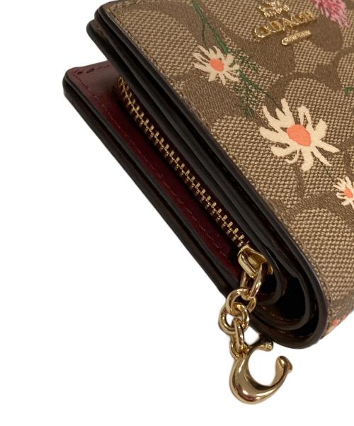 COACH（コーチ）COACH (コーチ) 2つ折り財布 花柄 サイズ:実寸サイズにご確認ください。の古着・服飾アイテム