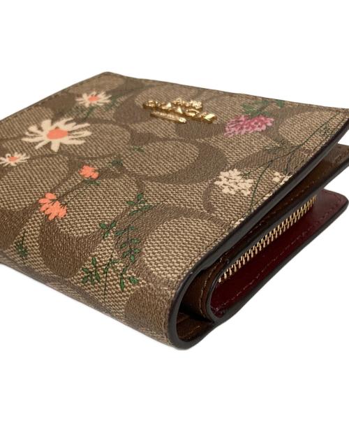 COACH（コーチ）COACH (コーチ) 2つ折り財布 花柄 サイズ:実寸サイズにご確認ください。の古着・服飾アイテム