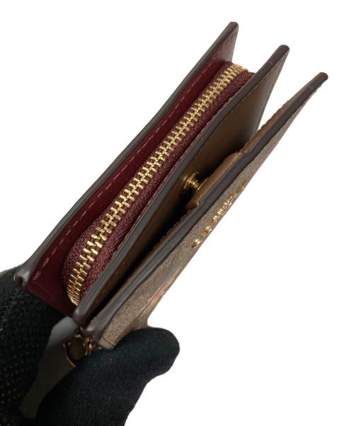 COACH（コーチ）COACH (コーチ) 2つ折り財布 花柄 サイズ:実寸サイズにご確認ください。の古着・服飾アイテム