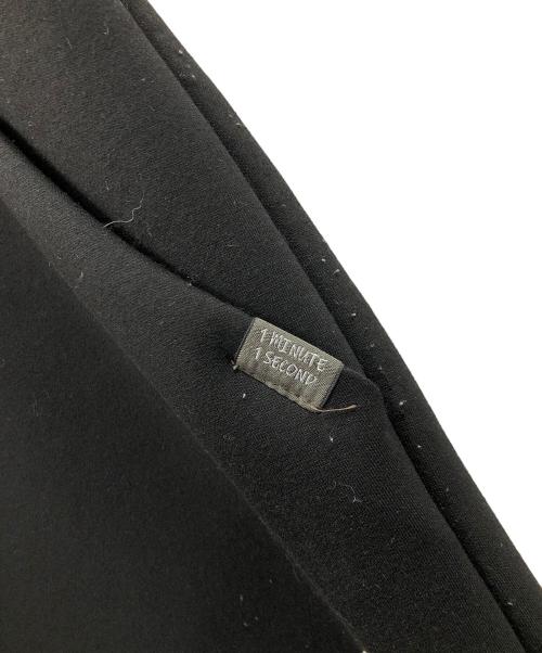 1minute 1second（ワンミニットワンセカンド）1minute 1second (ワンミニットワンセカンド) イージーパンツ cardboard knit pants with cursive print（カーボード ニット パンツ ウィズ カーシブ プリント） ブラック サイズ:Lの古着・服飾アイテム