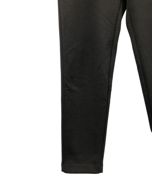 1minute 1second（ワンミニットワンセカンド）1minute 1second (ワンミニットワンセカンド) イージーパンツ cardboard knit pants with cursive print（カーボード ニット パンツ ウィズ カーシブ プリント） ブラック サイズ:Lの古着・服飾アイテム