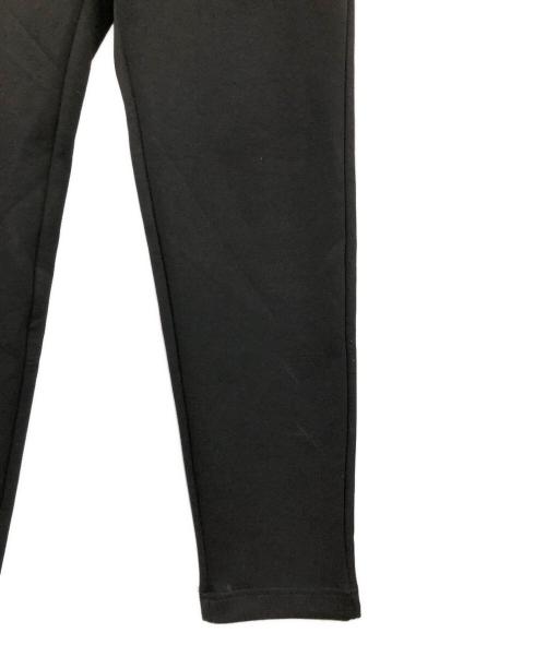 1minute 1second（ワンミニットワンセカンド）1minute 1second (ワンミニットワンセカンド) イージーパンツ cardboard knit pants with cursive print（カーボード ニット パンツ ウィズ カーシブ プリント） ブラック サイズ:Lの古着・服飾アイテム
