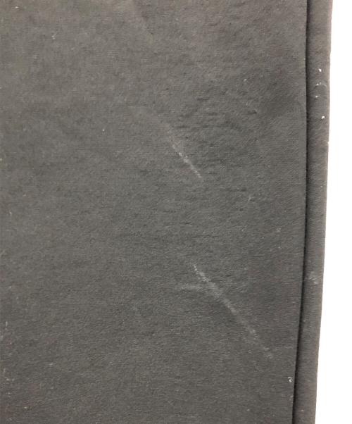 1minute 1second（ワンミニットワンセカンド）1minute 1second (ワンミニットワンセカンド) イージーパンツ cardboard knit pants with cursive print（カーボード ニット パンツ ウィズ カーシブ プリント） ブラック サイズ:Lの古着・服飾アイテム