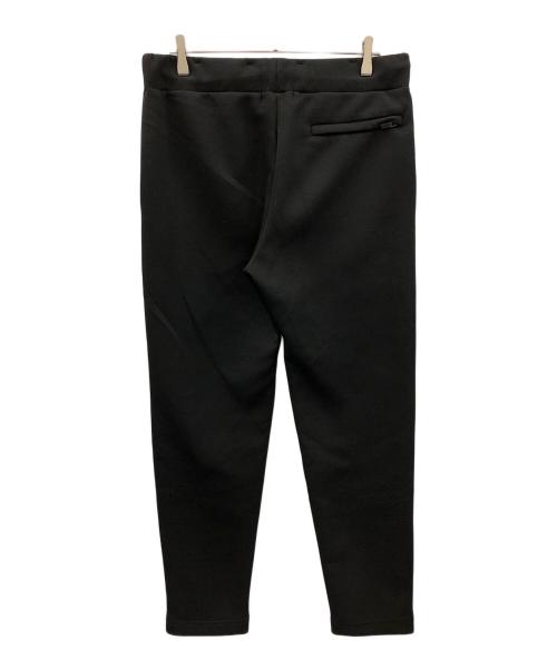 1minute 1second（ワンミニットワンセカンド）1minute 1second (ワンミニットワンセカンド) イージーパンツ cardboard knit pants with cursive print（カーボード ニット パンツ ウィズ カーシブ プリント） ブラック サイズ:Lの古着・服飾アイテム