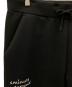 1minute 1second (ワンミニットワンセカンド) イージーパンツ cardboard knit pants with cursive print（カーボード ニット パンツ ウィズ カーシブ プリント） ブラック サイズ:L：6000円