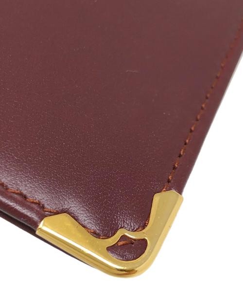 Cartier（カルティエ）Cartier (カルティエ) 長財布 二つ折り札入れ ワインレッド サイズ:実寸サイズにてご確認ください。の古着・服飾アイテム