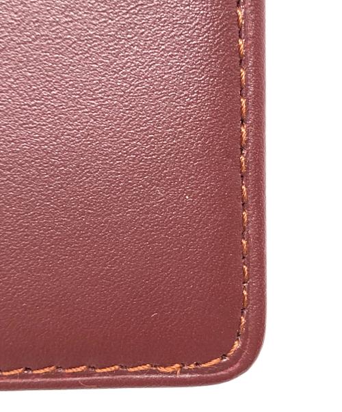 Cartier（カルティエ）Cartier (カルティエ) 長財布 二つ折り札入れ ワインレッド サイズ:実寸サイズにてご確認ください。の古着・服飾アイテム