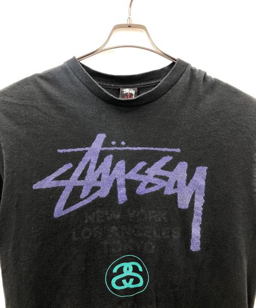 stussy（ステューシー）stussy (ステューシー) ワールドツアーT ブラック サイズ:Lの古着・服飾アイテム