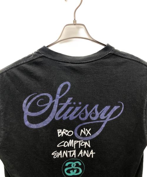 stussy（ステューシー）stussy (ステューシー) ワールドツアーT ブラック サイズ:Lの古着・服飾アイテム