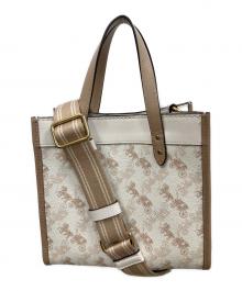 COACH（コーチ）の古着「2WAYバッグ ハンドバッグ ショルダーバッグ フィールド トート 22 シグネチャーキャンバス ホースアンドキャリッジプリント」｜アイボリー×ベージュ