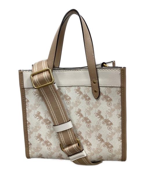 COACH（コーチ）COACH (コーチ) 2WAYバッグ ハンドバッグ ショルダーバッグ フィールド トート 22 シグネチャーキャンバス ホースアンドキャリッジプリント アイボリー×ベージュ サイズ:実寸サイズにてご確認ください。の古着・服飾アイテム