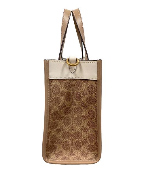 COACH（コーチ）COACH (コーチ) 2WAYバッグ ハンドバッグ ショルダーバッグ フィールド トート 22 シグネチャーキャンバス ホースアンドキャリッジプリント アイボリー×ベージュ サイズ:実寸サイズにてご確認ください。の古着・服飾アイテム