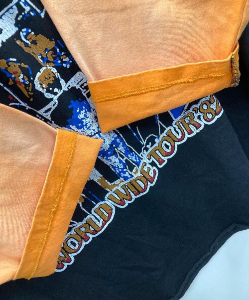 JACKSON MATISSE（ジャクソンマティス）JACKSON MATISSE (ジャクソンマティス) ラグランTシャツ WORLD TOUR 82（ワールド ツアー 82） ブラック×オレンジ サイズ:LARGEの古着・服飾アイテム