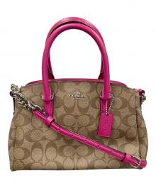 COACH（コーチ）の古着「2WAYバッグ ハンドバッグ ショルダーバッグ シグネチャー ミニ セージ キャリーオール」｜ブラウン×ピンク