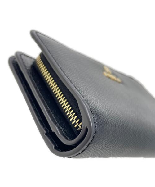 FURLA（フルラ）FURLA (フルラ) 2つ折り財布 CAMELIA（カメリア）コンパクトウォレット ブラック サイズ:実寸サイズにてご確認下さい。の古着・服飾アイテム