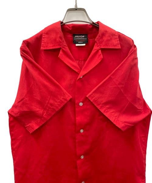 Hilton（ヒルトン）Hilton (ヒルトン) 半袖シャツ The Taming ofthe Shrew（ザ テイミング オブ ザ シュルー） レッド サイズ:SMALLの古着・服飾アイテム