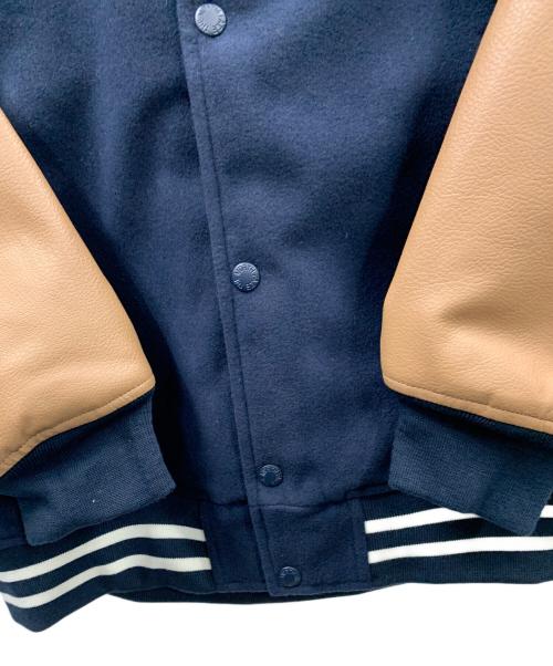 THE NORTH FACE（ザ ノース フェイス）THE NORTH FACE (ザ ノース フェイス) スタジャン VARISTY HEAT JACKET（バーシティ ヒート ジャケット） ネイビー×ブラウン サイズ:M/95 未使用品の古着・服飾アイテム