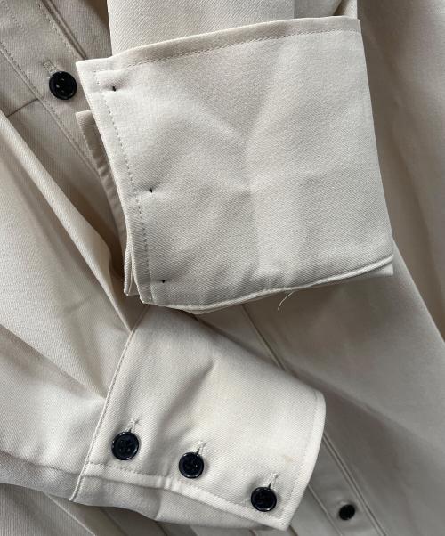 UNITED TOKYO（ユナイテッドトーキョー）UNITED TOKYO (ユナイテッドトーキョー) アシメプリーツシャツワンピース ベージュの古着・服飾アイテム