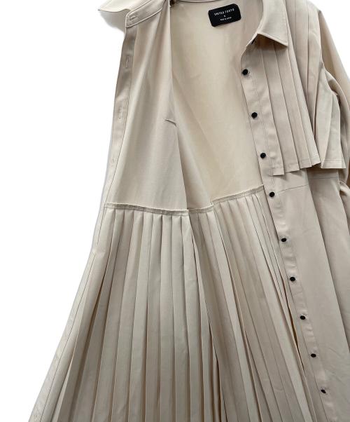 UNITED TOKYO（ユナイテッドトーキョー）UNITED TOKYO (ユナイテッドトーキョー) アシメプリーツシャツワンピース ベージュの古着・服飾アイテム