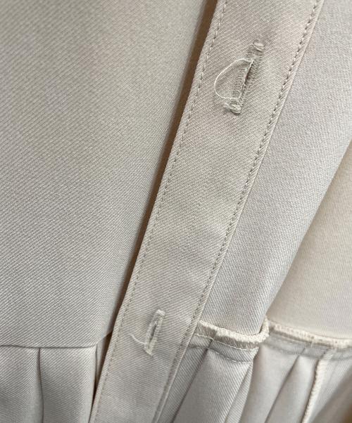 UNITED TOKYO（ユナイテッドトーキョー）UNITED TOKYO (ユナイテッドトーキョー) アシメプリーツシャツワンピース ベージュの古着・服飾アイテム
