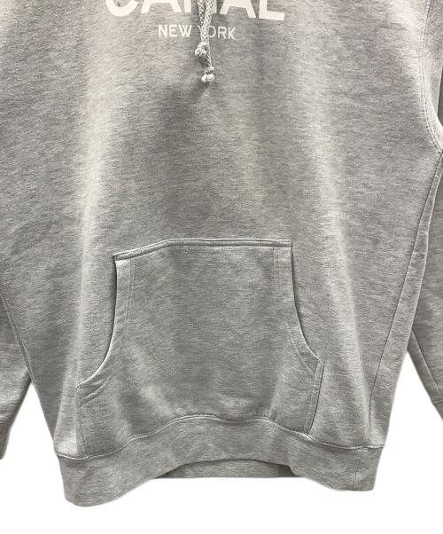 INDEPENDENT（インディペンデント）INDEPENDENT (インディペンデント) プルオーバーパーカー ライトグレー サイズ:Mの古着・服飾アイテム