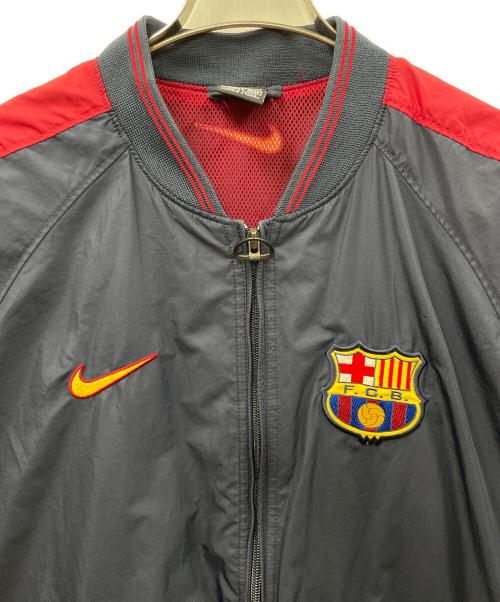 NIKE TEAM（ナイキチーム）NIKE TEAM (ナイキチーム) FCバルセロナ (エフシーバルセロナ) ナイロンジャケット ネイビー サイズ:Mの古着・服飾アイテム