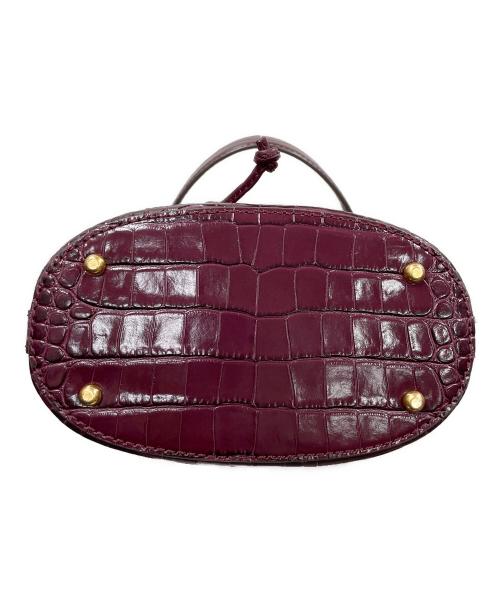 TORY BURCH（トリーバーチ）TORY BURCH (トリーバーチ) 巾着ショルダーバッグ ワインレッド×アイボリー サイズ:実寸サイズにてご確認ください。の古着・服飾アイテム