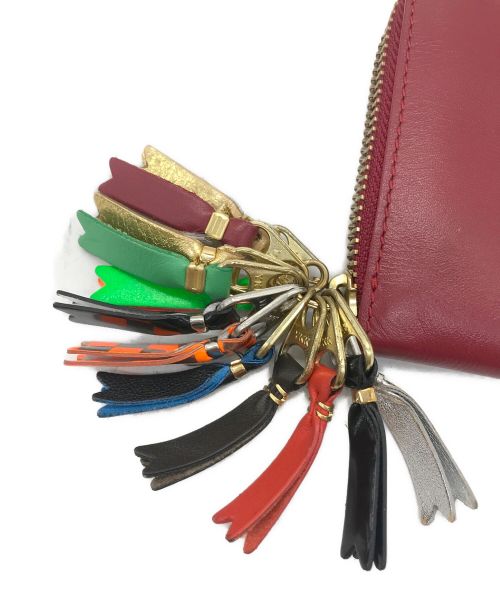 COMME des GARCONS（コムデギャルソン）COMME des GARCONS (コムデギャルソン) ZIPPER PULL  レッドの古着・服飾アイテム