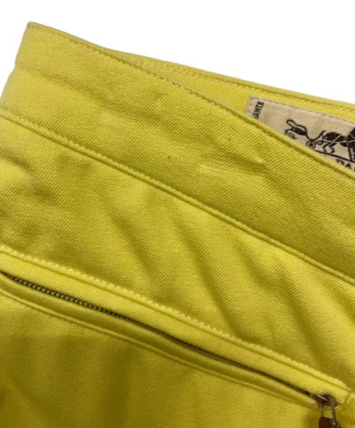 HERMES（エルメス）HERMES (エルメス) セリエボタンストレッチパンツ イエロー サイズ:38の古着・服飾アイテム