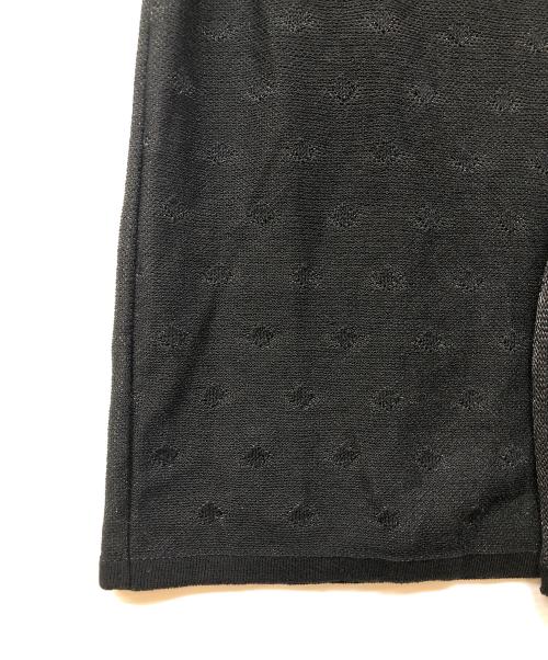 TAN（タン）TAN (タン) ニットラップスカート ブラック サイズ:FREEの古着・服飾アイテム