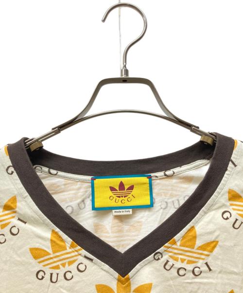 adidas（アディダス）adidas (アディダス) GUCCI (グッチ) Trefoil Print T-Shirt ベージュ サイズ:SIZE Sの古着・服飾アイテム