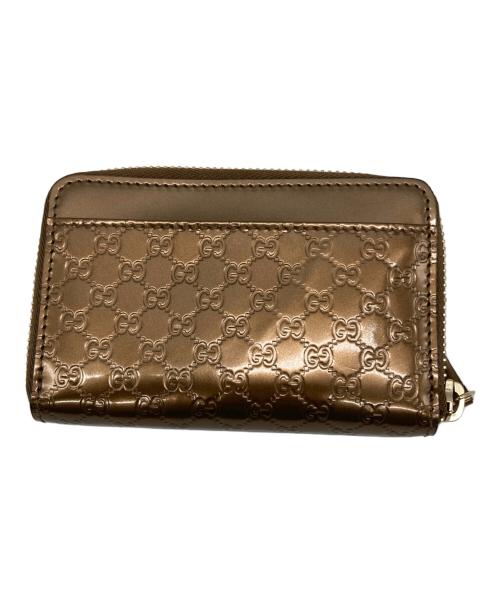 GUCCI（グッチ）GUCCI (グッチ) マイクログッチシマ パテントカードケース ゴールドの古着・服飾アイテム