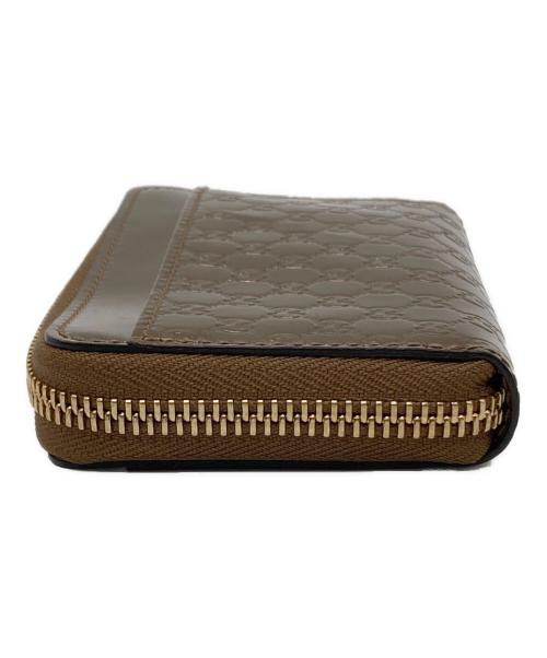 GUCCI（グッチ）GUCCI (グッチ) マイクログッチシマ パテントカードケース ゴールドの古着・服飾アイテム