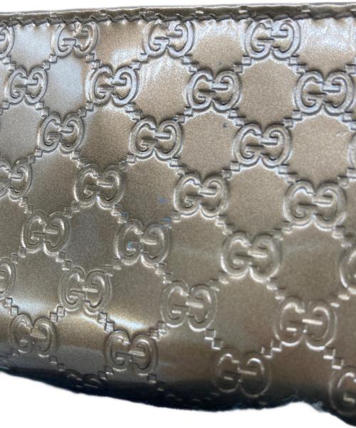 GUCCI（グッチ）GUCCI (グッチ) マイクログッチシマ パテントカードケース ゴールドの古着・服飾アイテム
