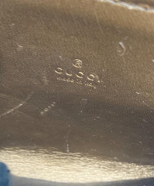 GUCCI（グッチ）GUCCI (グッチ) マイクログッチシマ パテントカードケース ゴールドの古着・服飾アイテム